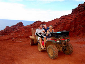  The jaunty Brenda Christian pilots an ATV with TNTV correspondent Mike Leyral and Aranui lecturer Keao NeSmith near St. Paul's Pool